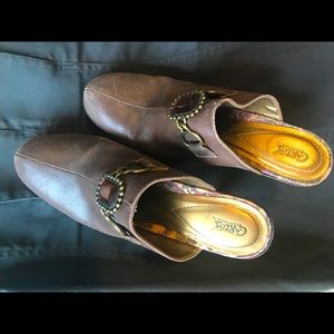 Carlos Santana distressed brown jeweled clogs